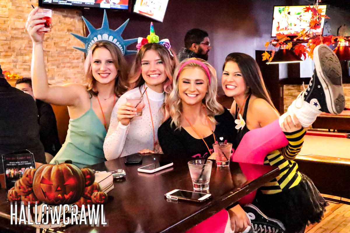 Fun girls in costume at HallowCrawl - Halloween Bar Crawl in Downtown Royal Oak, MI